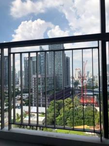 a view of a city skyline from a window at Super Luxury Condo in Bangkok