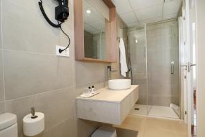 Koupelna v ubytování Hotel Montepiedra 4''''sup