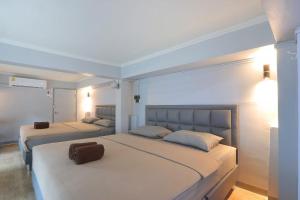 Postel nebo postele na pokoji v ubytování Baankhon Private room in Thai house Check in by yourself code inbox Adult Only