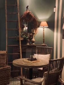 a dining room with a table and two chairs at Hotel Ristorante San Giuseppe in Cernobbio