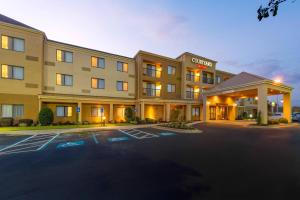 a rendering of a hotel with a parking lot at Courtyard by Marriott Albany in Albany