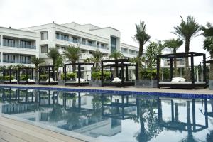 a view of the resort from the pool at Kiranshree Grand in Guwahati