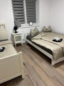Ένα ή περισσότερα κρεβάτια σε δωμάτιο στο Apartmány Tobias