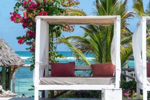 a swinging bed on the beach at Visiwa Beach Resort in Watamu