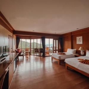 TV a/nebo společenská místnost v ubytování Ko Tao Resort Paradise Zone