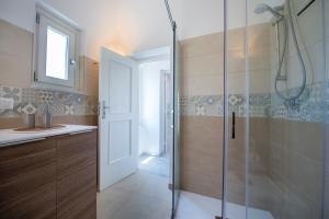 a bathroom with a shower and a sink at La Casetta di Camilla - Amalfi coast in Minori