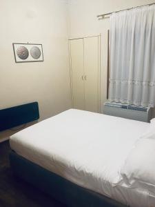 Ένα ή περισσότερα κρεβάτια σε δωμάτιο στο Multiproprietà Venezia