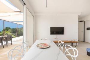 TV a/nebo společenská místnost v ubytování Villa Briosa Maldive del Salento Pescoluse