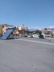 an empty parking lot with a skateboard ramp on it at Λευκό σπίτι in Ksamil