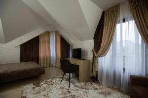 Postel nebo postele na pokoji v ubytování Premiera cottage