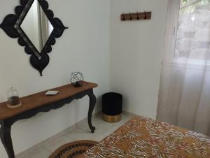 Postel nebo postele na pokoji v ubytování Logement 4 à 6 personnes avec Jacuzzi + 8 fotografií