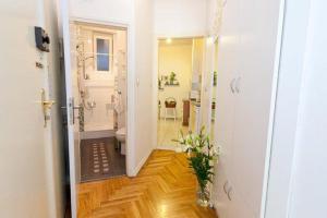 a bathroom with a toilet and a walk in shower at Main Square Apartment in Zagreb +54 photos