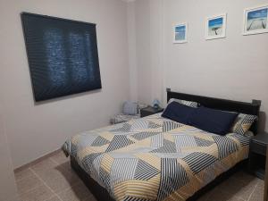 Ένα ή περισσότερα κρεβάτια σε δωμάτιο στο Casa Padrón 2