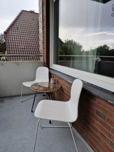 Balkón nebo terasa v ubytování Am Stadtpark mit Parkplatz 1ZKB 48qm + 3 fotografie