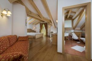 Rúm í herbergi á Hotel B&B Andreas