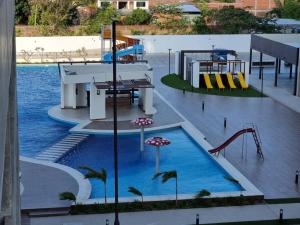 Hồ bơi trong/gần Santa Cruz Hermoso Departamento Piscina Toboganes +8 ảnh