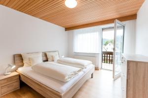 Postel nebo postele na pokoji v ubytování Hotel zur Post e.K.