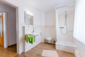 Koupelna v ubytování Hotel zur Post e.K.