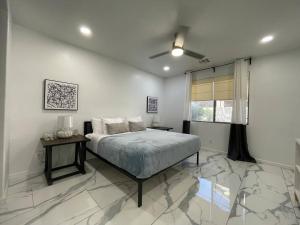 Ένα ή περισσότερα κρεβάτια σε δωμάτιο στο Gorgeous Abode 3 Bedrooms Hide-out in Mesa