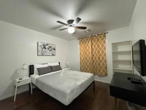 Ένα ή περισσότερα κρεβάτια σε δωμάτιο στο Gorgeous Abode 3 Bedrooms Hide-out in Mesa