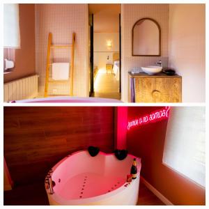 a bathroom with a bath tub in a room at Hospedaje Villa Pilar in Santillana del Mar
