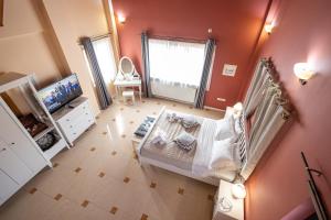 Postel nebo postele na pokoji v ubytování REALE - Art Luxury Villa