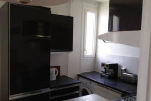 Foto dalla galleria di Bel Appartement T2 au pied du métro Jean Jaurès a Boulogne-Billancourt Altre 13 foto