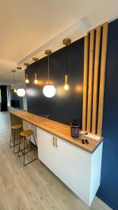 Zdjęcie z galerii obiektu BLUE IRO, lumineux, 4 chambres, balcon, 105m2 w mieście Saint-Étienne