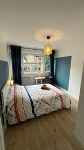 Zdjęcie z galerii obiektu BLUE IRO, lumineux, 4 chambres, balcon, 105m2 w mieście Saint-Étienne