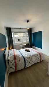 Zdjęcie z galerii obiektu BLUE IRO, lumineux, 4 chambres, balcon, 105m2 w mieście Saint-Étienne