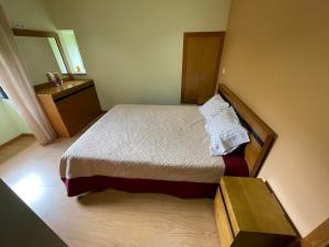 Postel nebo postele na pokoji v ubytování Casa da Quinta piscina privada perto Gerês + 34 fotografií