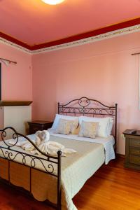 Postel nebo postele na pokoji v ubytování REALE - Art Luxury Villa