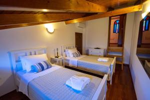 Postel nebo postele na pokoji v ubytování REALE - Art Luxury Villa