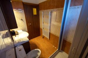 Koupelna v ubytování REALE - Art Luxury Villa