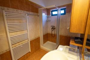 Koupelna v ubytování REALE - Art Luxury Villa