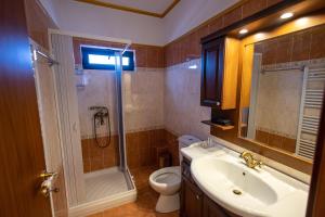 Koupelna v ubytování REALE - Art Luxury Villa