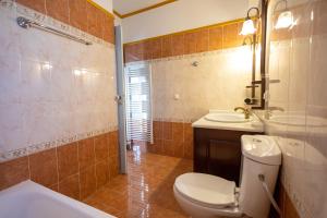 Koupelna v ubytování REALE - Art Luxury Villa