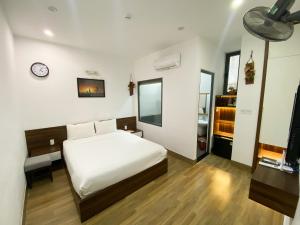 Posteľ alebo postele v izbe v ubytovaní Nguyên Hương Hotel