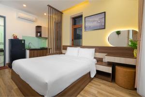 Posteľ alebo postele v izbe v ubytovaní Nguyên Hương Hotel