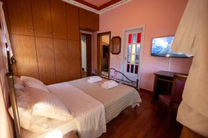Postel nebo postele na pokoji v ubytování REALE - Art Luxury Villa