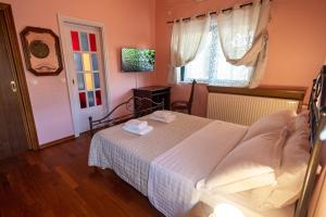Postel nebo postele na pokoji v ubytování REALE - Art Luxury Villa