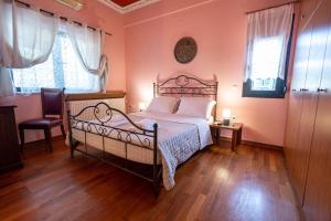 Postel nebo postele na pokoji v ubytování REALE - Art Luxury Villa