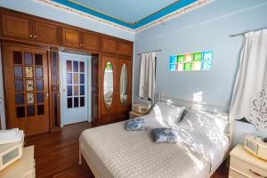 Postel nebo postele na pokoji v ubytování REALE - Art Luxury Villa