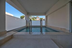 Πισίνα στο ή κοντά στο Milonas Home