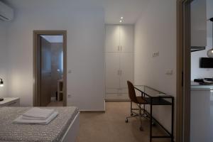 Ένα ή περισσότερα κρεβάτια σε δωμάτιο στο Milonas Home +10 φωτογραφίες