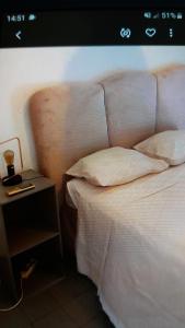 Cama ou camas em um quarto em Bel Appartement Face à La Plage au Diamant