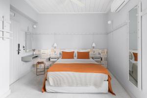Letto o letti in una camera di Argonauta Hotel