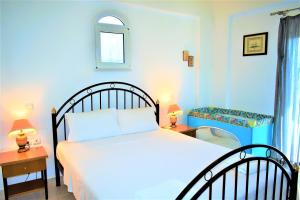 Ένα ή περισσότερα κρεβάτια σε δωμάτιο στο Ioanna's Villa 10 minutes walking from sea