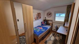 Letto o letti in una camera di s'KLINGI-Haus