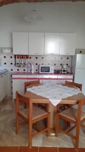 Köök või kööginurk majutusasutuses Orgosio